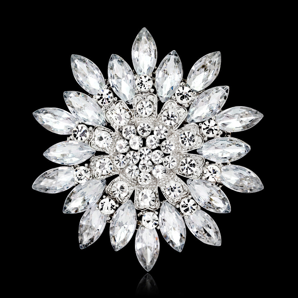 Diamante brooch with marquise-shaped stones on a black background