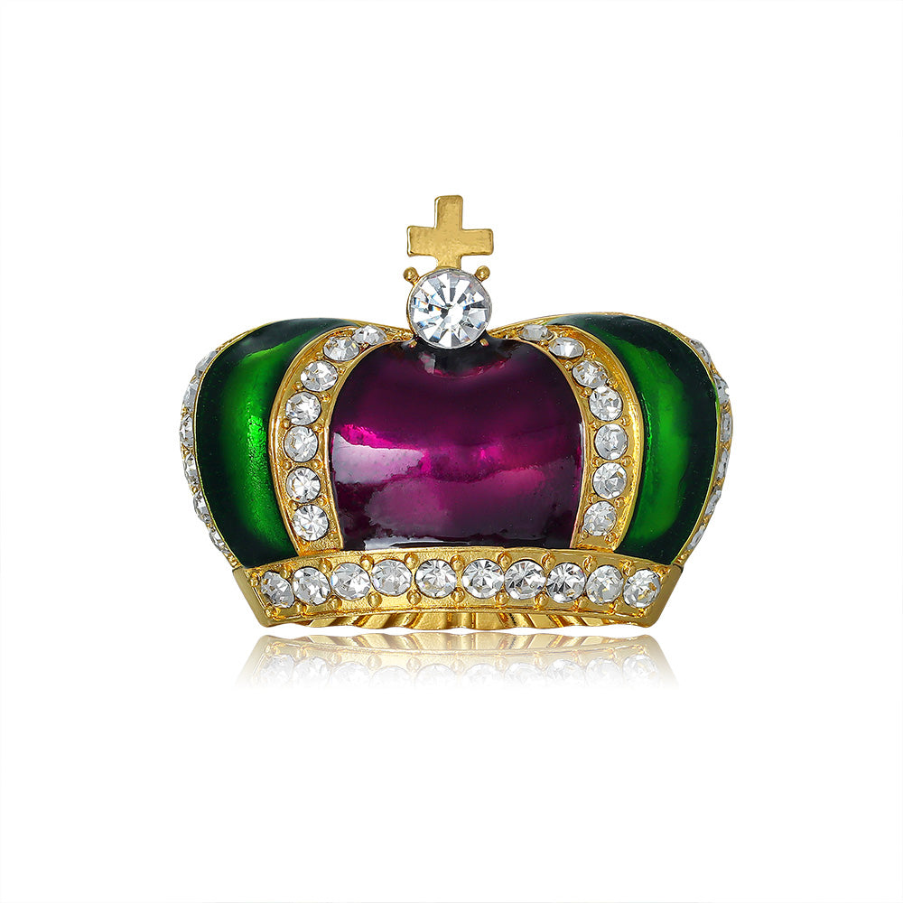 Decorative crown with green and purple gemstones on a white background