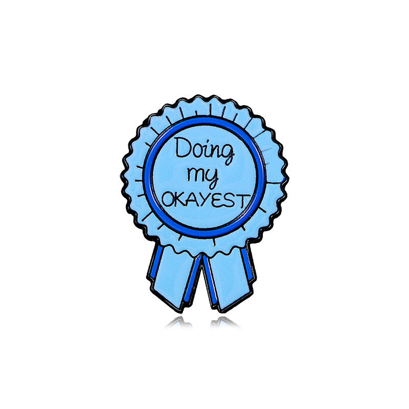 Blue ribbon badge with text 'Doing my OKAYEST' on a white background