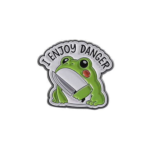 Frog holding a knife with 'I Enjoy Danger' text on a white background