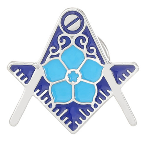 Decorative SQUARE AND COMPASS  WITH LIGHT BLUE FORGET ME NOT FLOWER LAPEL PINt with blue floral design on a white background