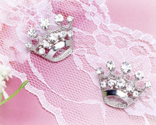 Load image into Gallery viewer, Silver tiara-shaped hair clips on pink lace fabric