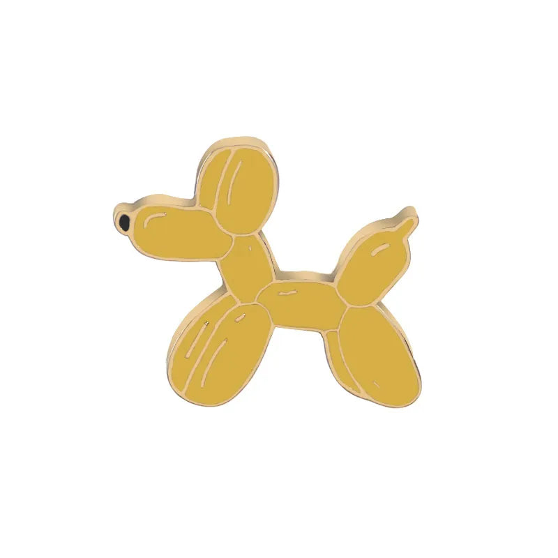 Yellow balloon dog pin on a white background