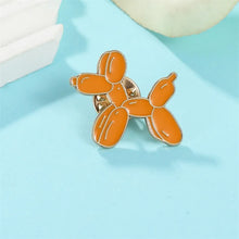 Load image into Gallery viewer, Orange balloon dog pin on a light blue background
