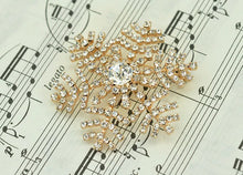 Load image into Gallery viewer, Gold brooch with crystals on sheet music