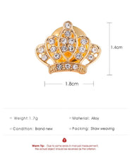 Load image into Gallery viewer, Gold crown-shaped brooch with rhinestones and measurements on a white background
