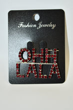 Load image into Gallery viewer, Red and silver jewelry on a black card with 'Fashion Jewelry' branding.
