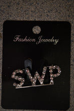 Load image into Gallery viewer, Silver 'SWP' brooch on a black card with 'Fashion Jewelry' text.