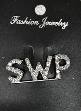 Load image into Gallery viewer, Silver 'SWP' lettered jewelry on a black card with 'Fashion Jewelry' branding.