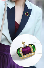 Load image into Gallery viewer, Person wearing a stylish outfit with a close-up of a decorative brooch.