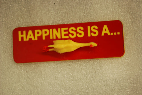 HAPPINESS IS A RUBBER CHICKEN