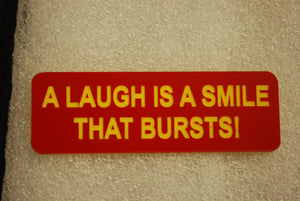 A LAUGH IS A SMILE THAT BURSTS