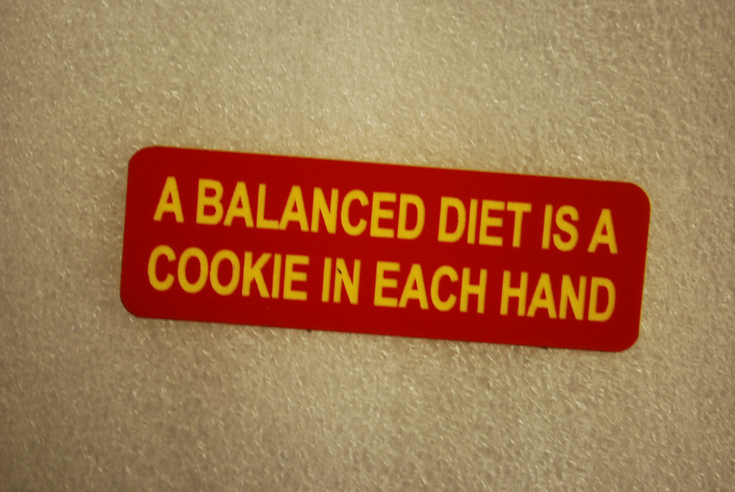 A BALANCED DIET IS A COOKIE IN EACH HAND