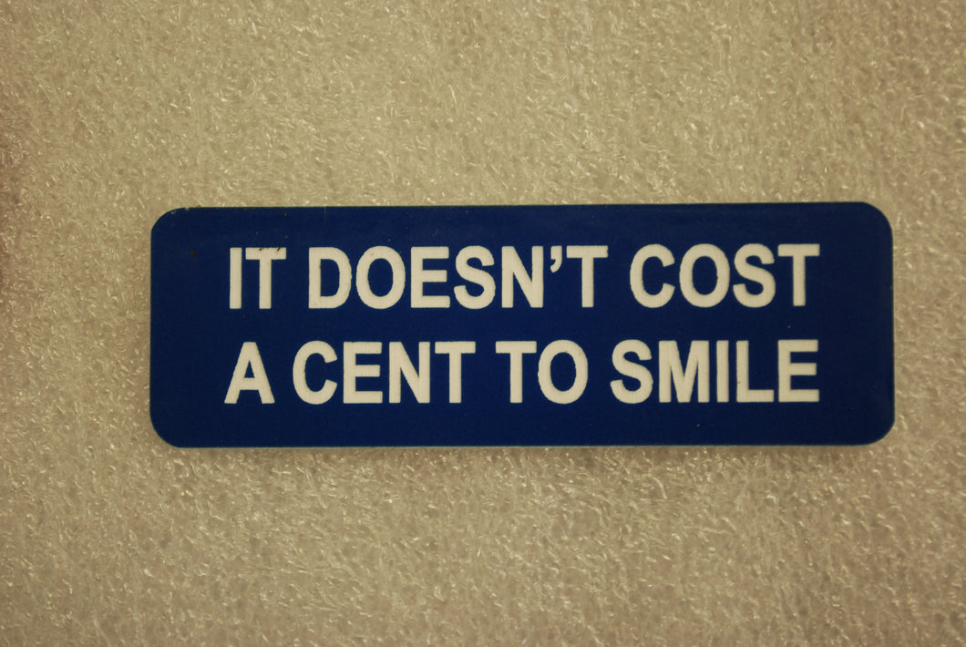 IT DOESN'T COST A CENT TO SMILE